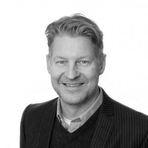 Ett svartvitt porträttfoto på Fredrik Stigebrandt, CTO på företaget PLS Energy Systems.